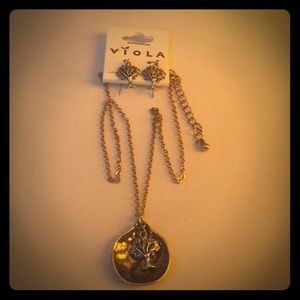 Beautiful charm necklace with matching earrings.